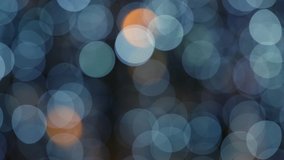 Decoration at Happy christmas holiday. Happy new year. Glitter Blue and Orange Soft-Focus Lights Flashing. Focus Features. Lens Bokeh. Flare lights. Dark Background. Close up - Powered by Shutterstock - Get 15% off with code: PIKWIZARD15