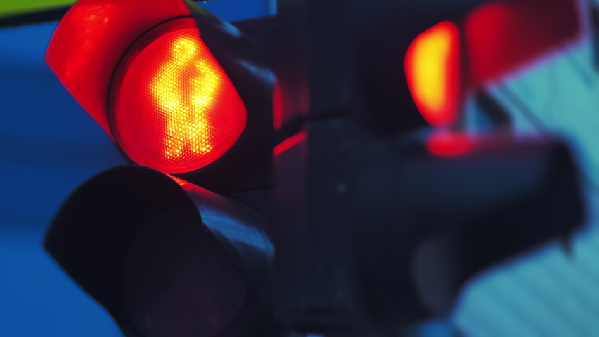 Close-up. Two traffic lights turn red and turn green. Countdown seconds. City life | Shutterstock HD Video #1061907028