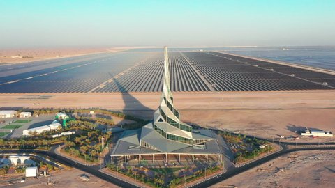 Aerial view of Solar innovation centre in Dubai desert next to solar farm with thousands of solar panels and photovoltaic cells for renewable energy - Dubai, UAE - Sep 2020