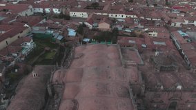 4k daytime aerial drone footage revealing the main Cathedral from Plaza de Armas in Cusco, Peru during Coronavirus lockdown. Dolly out and tilt up wide angle shot. - Powered by Shutterstock - Get 15% off with code: PIKWIZARD15