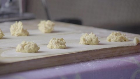 Process of preparing fresh homemade pasta. Agnolotti. Slow motion 4K