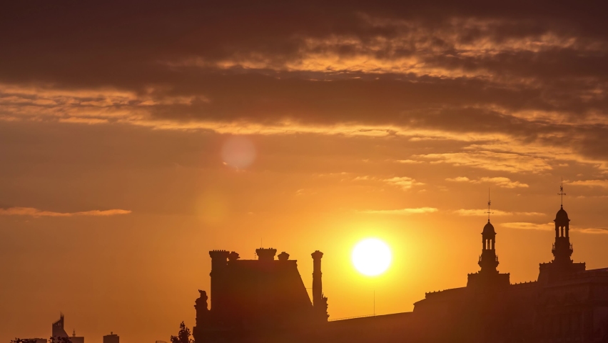 Sunset near Pont des Arts in Paris timelapse from Pont Neuf, France. Ship on the River Seine near square of the Vert-Galant