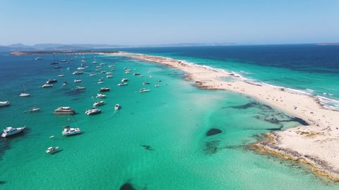 Yachting in the Balearic islands around Ibiza. Aerial View of many yachts in a bay on Formentera island.