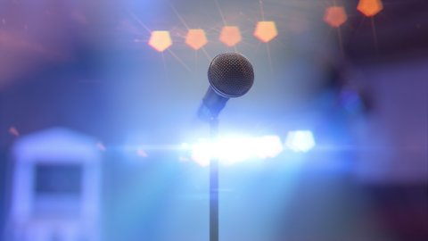 3d animation around the microphone on the stage in the concert hall against the shining stage lights. Colorful spotlights flashes with the rhythm of the music. The performance with crowds of fans.