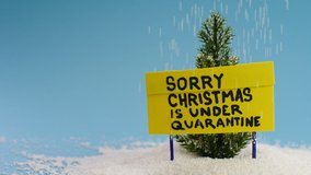 Holiday during pandemic concept with message Sorry Christmas is under quarantine - Powered by Shutterstock - Get 15% off with code: PIKWIZARD15