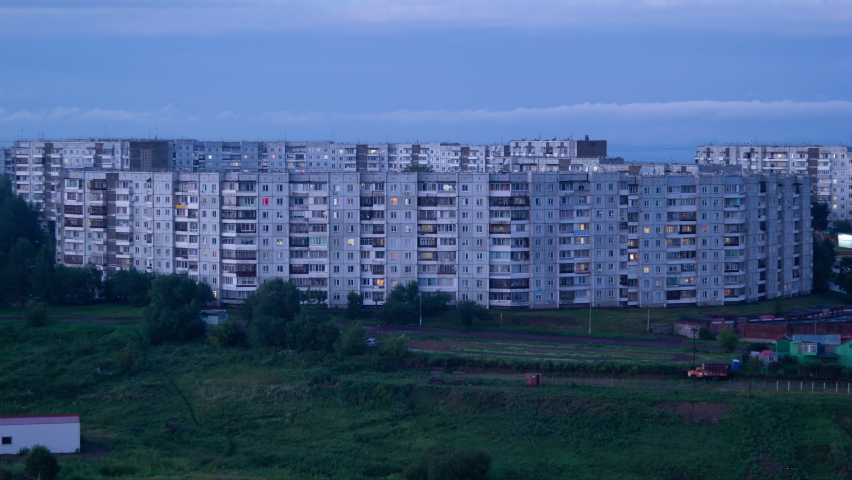 Night falls on the city. Buildings in the sleeping region, City Time Lapse