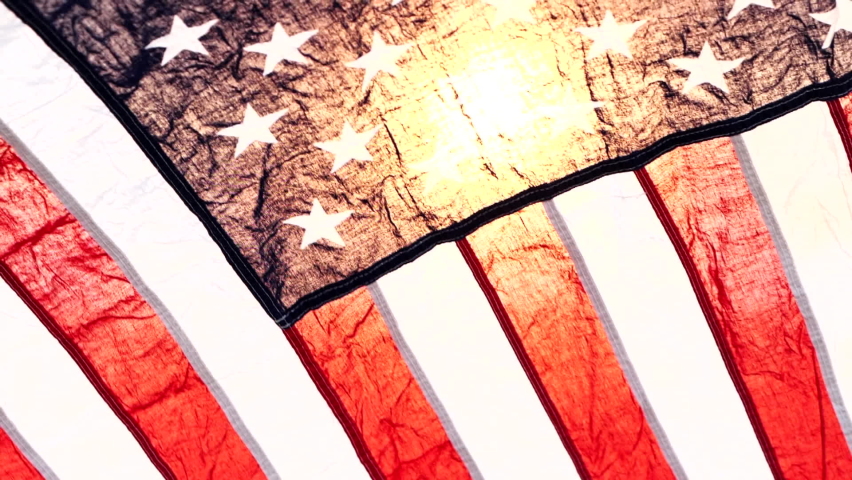 Close up American flag waving on sunset with soft focus, Slow Motion. Concept of Memorial Day or 4th of July, Independence Day, Veterans Day, Celebrate USA, American Election. America Concept. Royalty-Free Stock Footage #1061999302