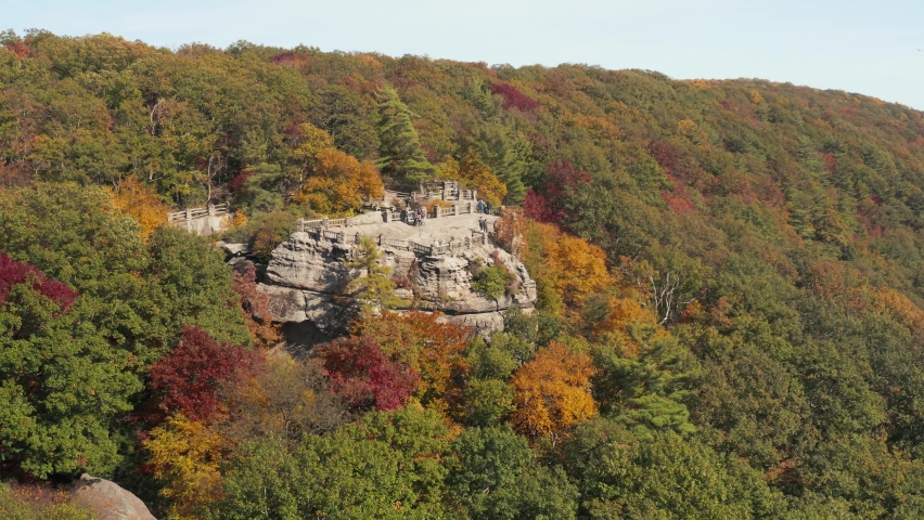 Aerial drone image of the Coopers Rock state park overlook over the Cheat River in narrow wooded gorge in the autumn. Located near Morgantown WV