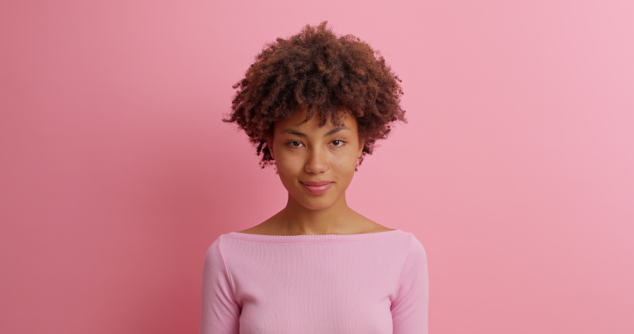 This is me. Self confident serious woman in casual clothing points at herself being proud of own achievements poses against pink background. Assertive boastful lady brags her accomplishments Royalty-Free Stock Footage #1062011050