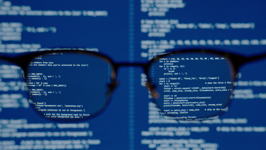 Coding on blue screen computer system thru eye glasses insight vision in data scientist programming ai for machine learning operation, modeling predictive analytics, data engineering IT skill concept. Royalty-Free Stock Footage #1062013591