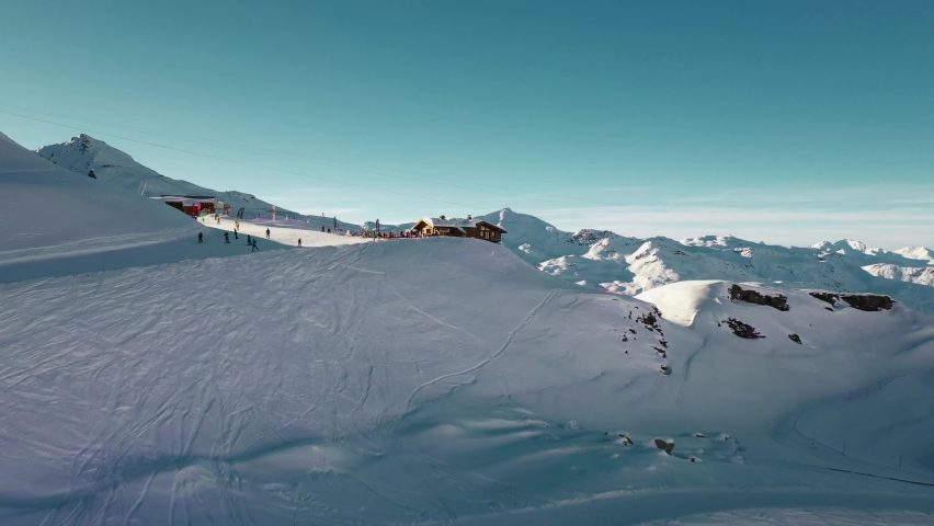 Aerial: amazing Val Thorens ski resort, French Alps peaks Royalty-Free Stock Footage #1062018112