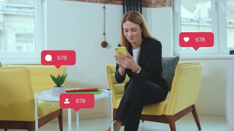 Smart pleased successful PR manager of company checking out social networks. Young blonde Caucasian woman in black suit sitting on yellow armchair and using smartphone in office. Indoors. Digital