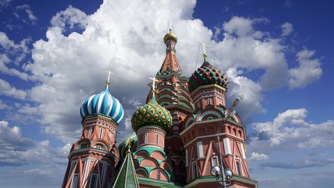 Saint Basil cathedral (Temple of Basil the Blessed) against the moving clouds, Red Square, Moscow, Russia 