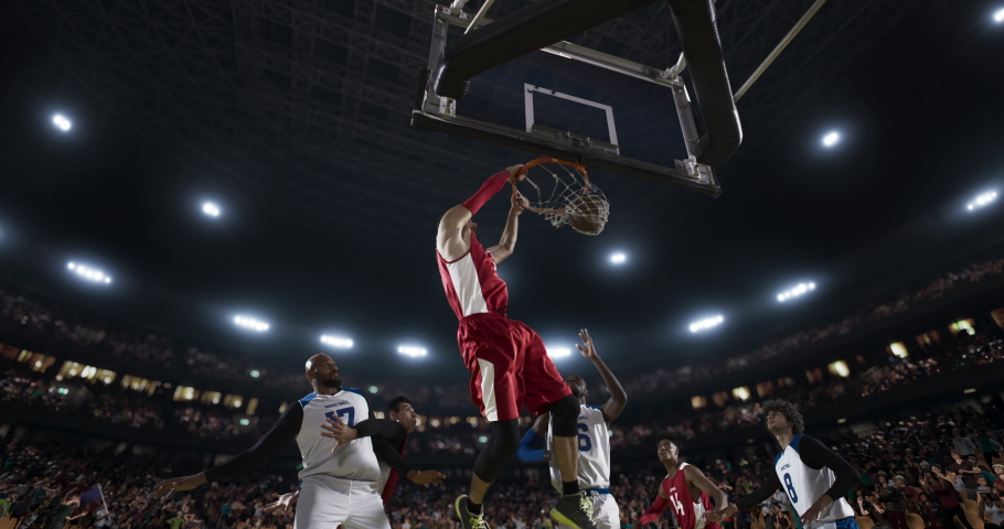 Basketball players on big professional arena during the game. Tense moment of the game. View from below the basket Royalty-Free Stock Footage #1062050446