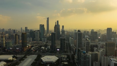 sunset time sky guangzhou city downtown traffic street square aerial timelapse panorama 4k china