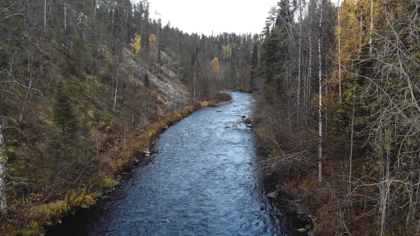 Autumn view of Oulanka National Park landscape, during hiking, a finnish national park in the Northern Ostrobothnia and Lapland regions of Finland, wooden wilderness hut, cabin cottage and campground