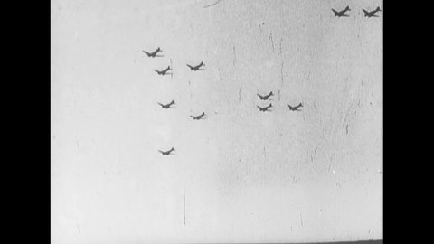 CIRCA 1940s - Troop carrier aircraft drop paratroopers over Europe despite bad weather and poor visibility, during World War II.