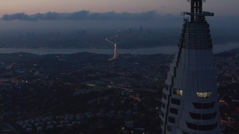 Huge Skyscraper Istanbul TV Tower on Hill with epic view over all of Istanbul, Turkey at Dusk, Aerial Drone Shot, Istanbul, Turkey on September 17th 2020