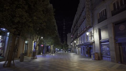 MADRID -SPAIN - OCTOBER 27 2020. No people in empty pedestrian Arenal street, in downtown Madrid, following the imposed midnight to 6am curfew to curb coronavirus infections during covid second wave