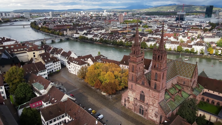 Aerial view over the city of Basel Switzerland and Cathedral - drone footage
