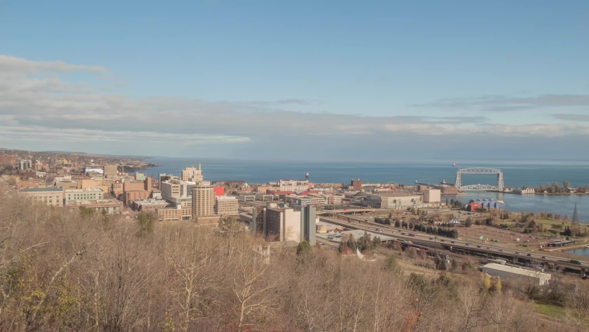 A Wide Angle 4K Timelapse Shot Overlooking the Duluth, MN Cityscape and Lake Superior Vista on a Beautiful Late Fall Day