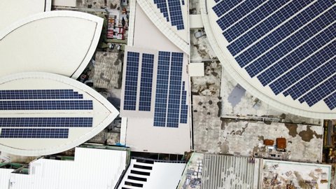 4K UHD Footage Of  Aerial view of a solar panel on building roof top. Part of reduce reuse and restore. Renewable energy concept