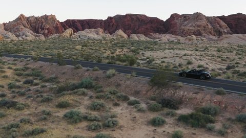 Nevada / United States - 05 24 2019: Black Ferrari 488 travelling through the Valley of Fire
