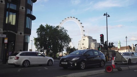 London / United Kingdom (UK) - 07 15 2019: Traffic in London, cars passing on Westminster Street road, static view