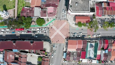 Penang Island , Penang / Malaysia - 12 14 2019: Busy intersection of Chulia St. and Jalan Masjid Kapitan Keling avenues seen from above with heavy car