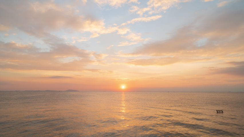 Beautiful cloudscape over the sea, sunset time lapse shot | Shutterstock HD Video #1062099694