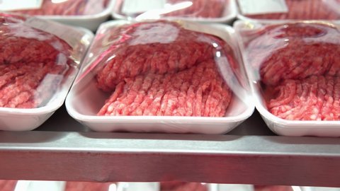 Minced meat in the store close-up. sale of fresh meat in a supermarket