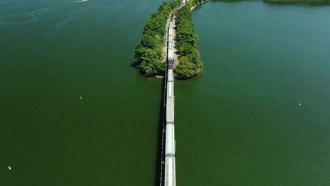 Train passing over rail road bridge at West Point Lake in Georgia