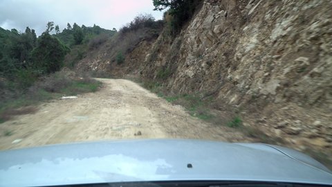 Offroad rural road drive pov at Mount Athos, Greece. The Holy Mountain Athos in Greece has been listed as a World Heritage Site.