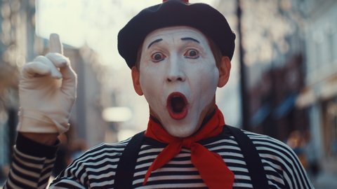 Surprised mime on the street in the city