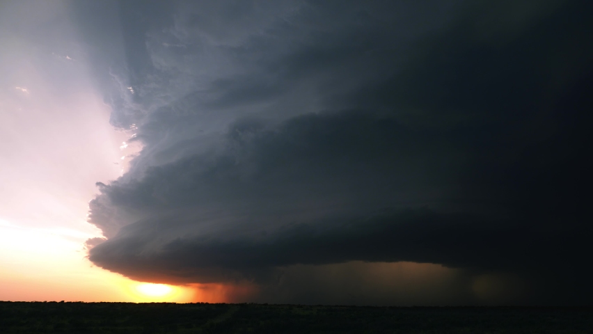 A Large Supercell Thunderstorm Spins Through Tornado Alley At Sunset During The 2020 Storm Season