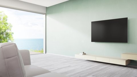 Television shelf on turquoise wall of large living room and sofa near TV in modern beach house or luxury villa. Home interior 3d rendering with sea view.