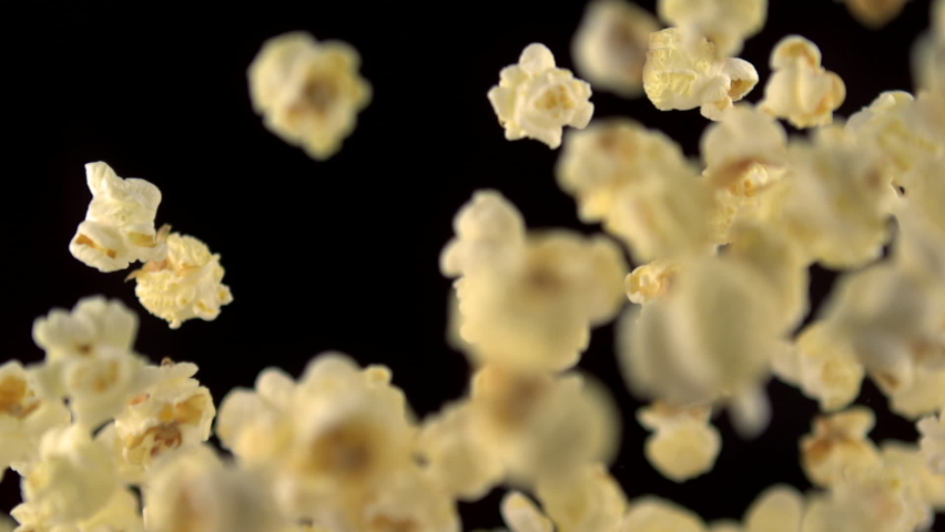 Pop corn flying up in close up slow motion at 1000fps filmed with high speed camera | Shutterstock HD Video #1062157489