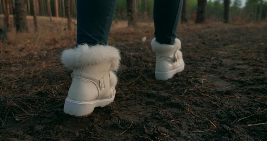 Woman Walking Hiking. Close up Female Footsteps Footwear Footprints on Dirt Road. Morning Evening Sunshine. Autumn Season in Wood Forest 4K