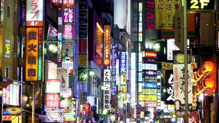 SHINJUKU, TOKYO, JAPAN : View of street and sign (billboard and neon) at Kabukicho downtown area at night. All the logo are blurred or overwritten for this video. Japanese nightlife concept shot. | Shutterstock HD Video #1062169456