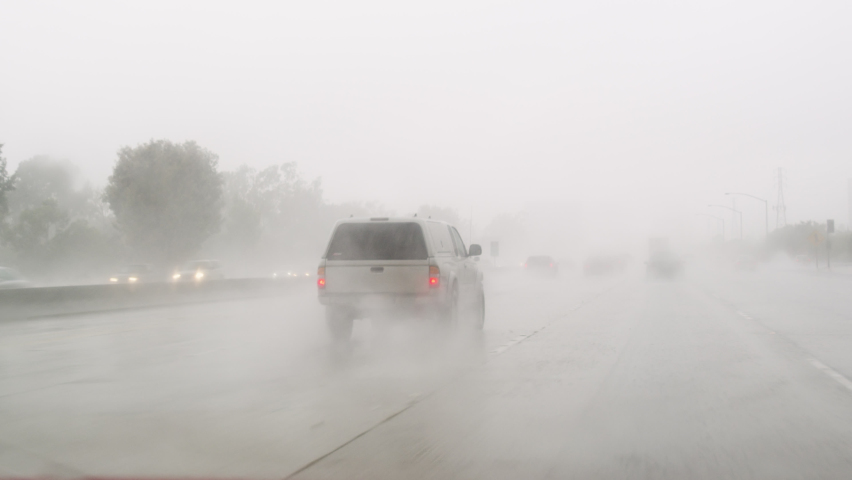 Heavy Downpour on the while driving on the Freeway. Royalty-Free Stock Footage #1062169561