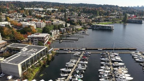 Aerial / drone footage of Kirkland, Moss Bay commercial and residential suburban neighborhood near Bellevue and Seattle, King County, Pacific Northwest Washington