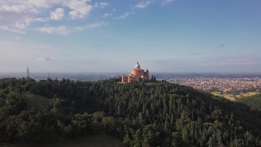 Drone shot looking over Santuario della Madonna di San Luca onto Bologna Royalty-Free Stock Footage #1062182638