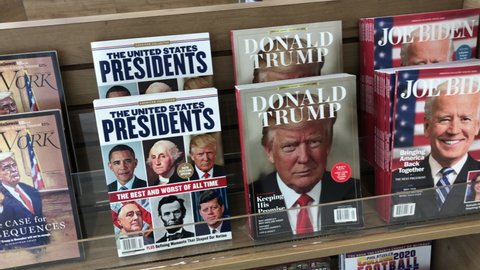 Staten Island, New York  United States - October 17 2020: Magazines on shelf with Donal Trump and Joe Biden on covers. The United States Presidents, The Best and Worst of All Time.