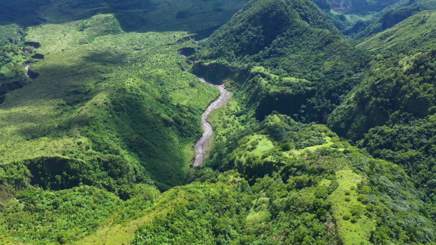 mountain river in the mountains Pelee volcano aerial view Martinique caribbean island french territory  Royalty-Free Stock Footage #1062186817