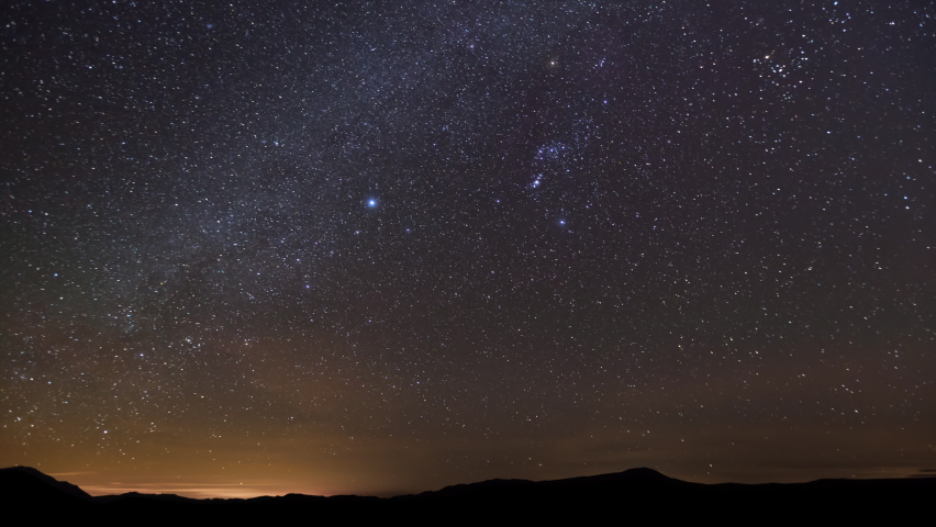 Amazing time-lapse of the stars moving across the night sky. Royalty-Free Stock Footage #1062190309