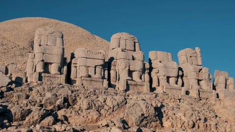 Nemrut mountain peaks in the famous stone statues and mythological ruins in Turkey