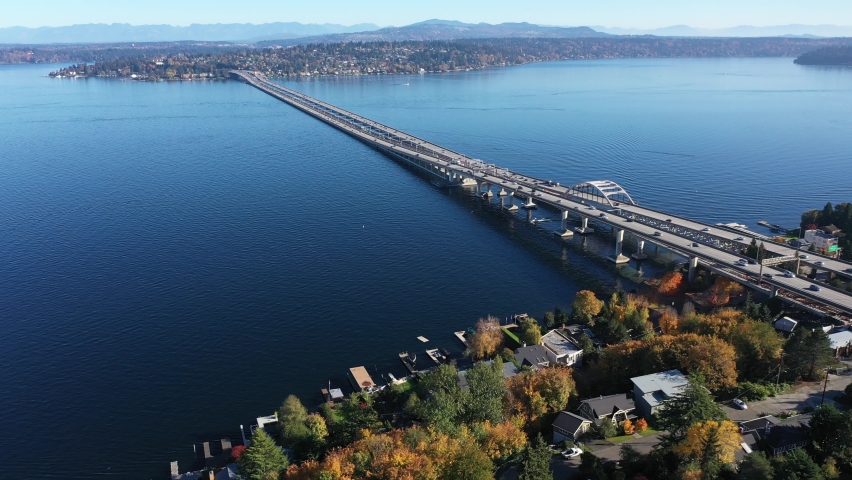 Aerial / drone footage of East side of Seattle, Mercer Island Town, Roanoke, McGilvara, the I-90 bridge, Lake Washington and surrounding suburbs in King County, Washington
