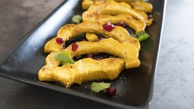 Zooming out of a Plate of Roasted Acorn Squash with Cranberries - Powered by Shutterstock - Get 15% off with code: PIKWIZARD15