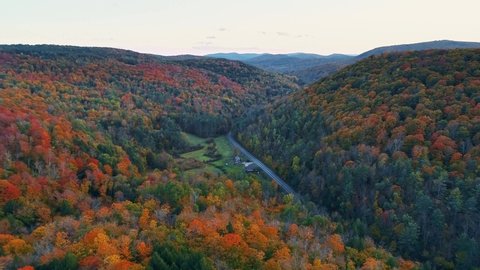 Aerial view of mountain with Autumn foliage in New England USA 4k