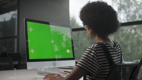 Business Woman Hands Working Internet on Pc Computer On Desk. Girl Hands Typing on Green Screen Notebook. Close Up Female Freelancer Searches For Information on The Internet